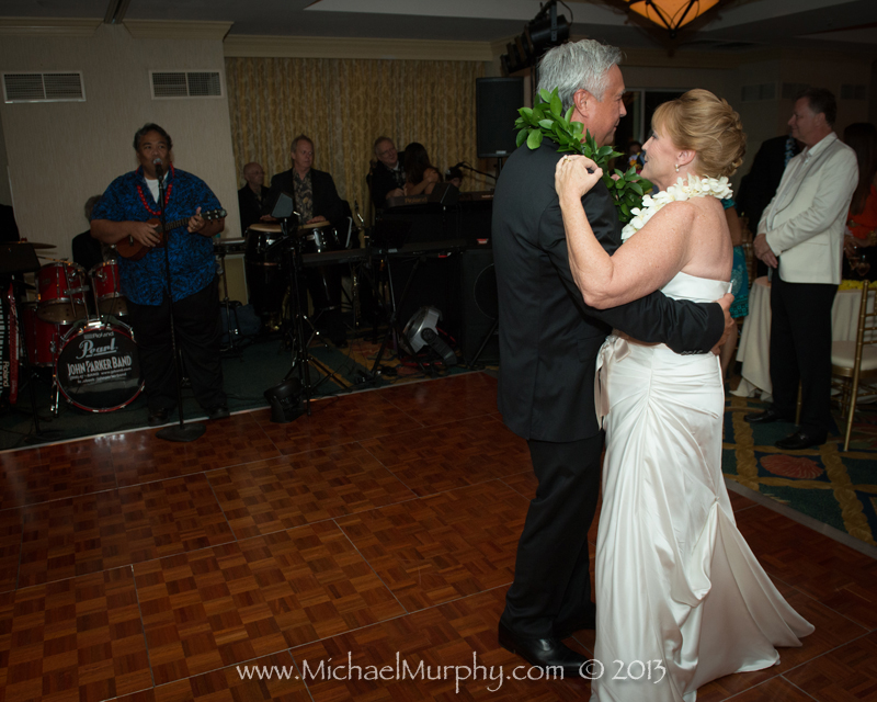 Couple shares first dance to John Parker Band.