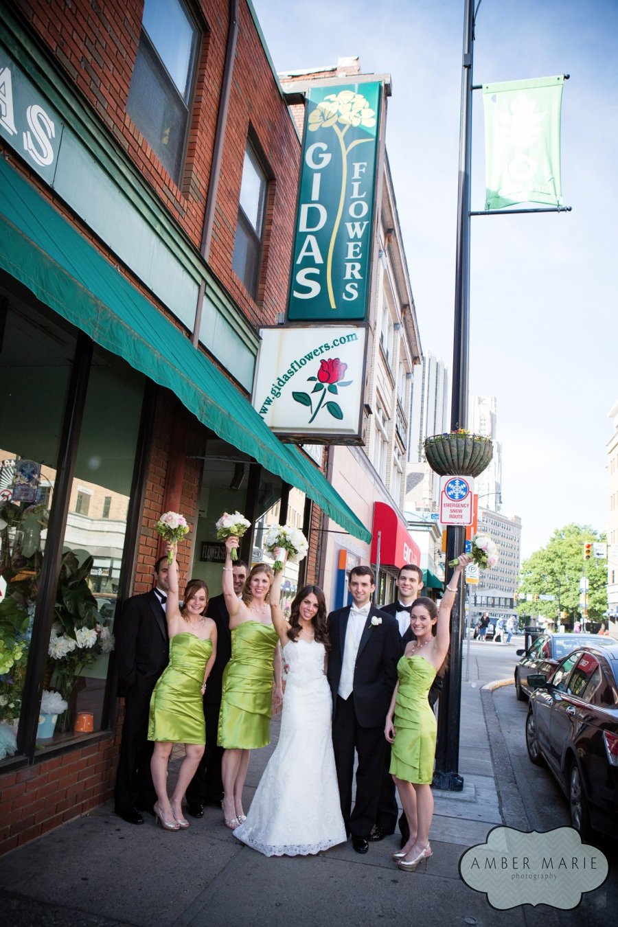 Bride and groom and wedding party at Gidas Flowers, the family business, in Pittsburgh.