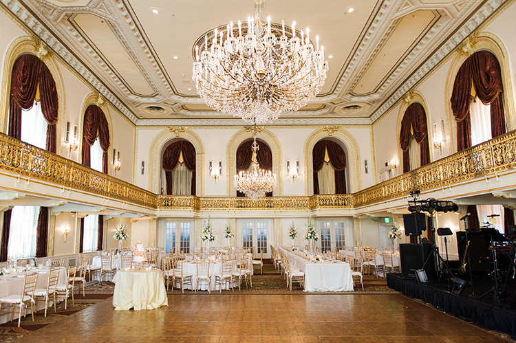 Omni William Penn Wedding Reception in Ballroom with Arched Windows and Chandelier 