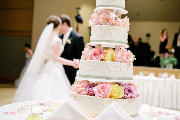Circuit Center Ballroom Wedding Reception - Newlyweds Dancing Behind Wedding Cake