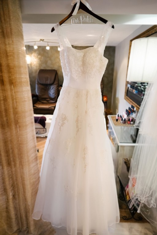 Circuit Center Ballroom Wedding - Wedding Dress Hangs Up in Spa