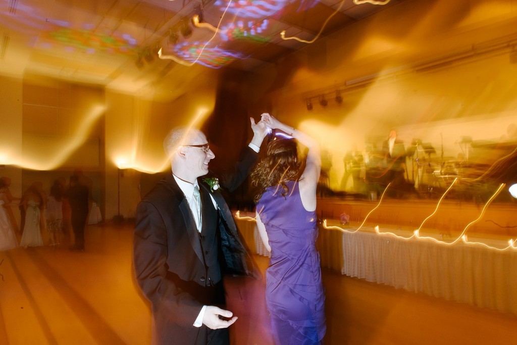Circuit Center Ballroom Wedding Reception - Couple Twirls to John Parker Band