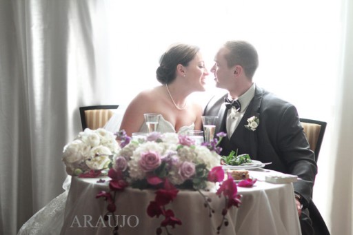 Renaissance Hotel Wedding Reception - Newlyweds Sitting at Sweetheart Table 
